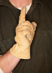 Image showing Man with Leather Construction Glove and Number One Gesture