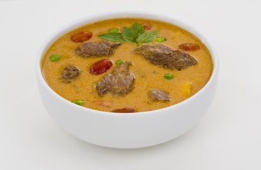 Image showing red curry in a white bowl