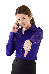 Image showing woman with thumb down gesture and mobile phone