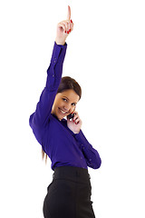 Image showing businesswoman on the phone winning