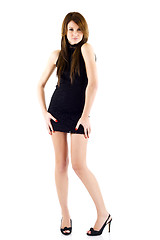 Image showing Pretty young woman in short black dress