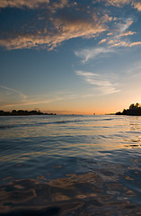 Image showing sunset over floating water