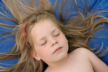 Image showing Little girl sunbathing