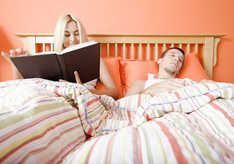 Image showing Couple Relaxing in Bed