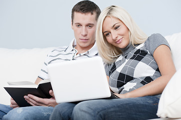 Image showing Couple Relaxing on Couch