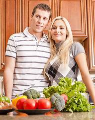 Image showing Young Couple Posing in Kitchen