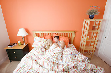 Image showing Young Couple Sleeping in Bed