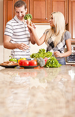 Image showing Young Couple in Kitchen