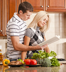 Image showing Young Couple Cooking