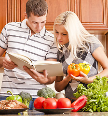 Image showing Young Couple Cooking