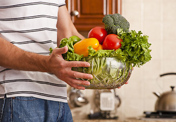 Image showing Man Holding Bowl of Vegetables