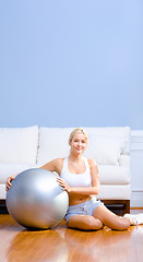 Image showing Young Woman with Exercise Ball