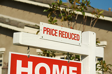 Image showing Price Reduced Real Estate Sign & New Home
