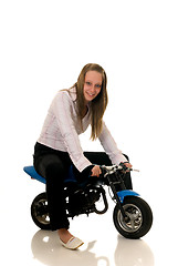 Image showing Youngster with her pocketbike