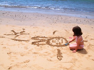 Image showing child drawing at the beach