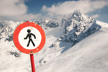 Image showing Warning sign in snowy mountains