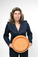 Image showing sexy businesswoman with clock, business photo