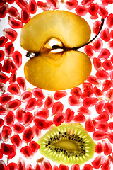 Image showing beautiful pomegranate grains, kiwi and tasty apple 