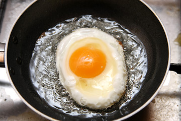 Image showing beautiful and tasty Fried egg in a frying pan