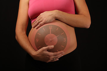 Image showing beautiful pregnant woman expecting a baby girl
