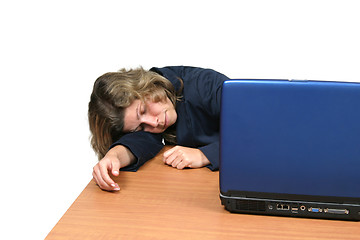 Image showing young woman dreaming on laptop