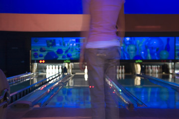 Image showing Waiting for her turn in the Bowling Alley