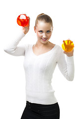 Image showing Happy smile woman and hold color disks