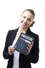 Image showing Confident woman hold calculator