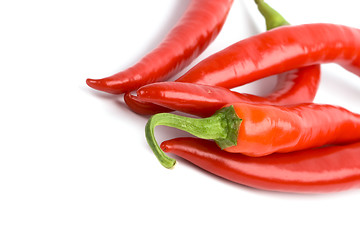 Image showing five red chilli peppers