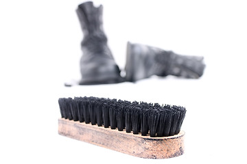 Image showing Brush and boots