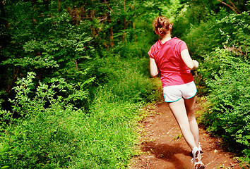 Image showing Woman In Red Running
