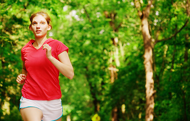 Image showing Woman In Red Running