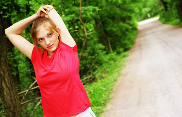 Image showing Woman In Red Running