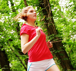 Image showing Woman In Red Running