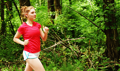 Image showing Woman In Red Running