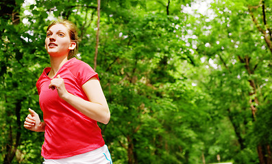 Image showing Woman In Red Running