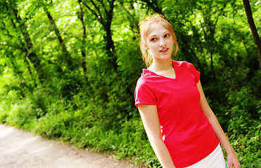 Image showing Woman In Red Running