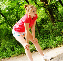 Image showing Woman In Red Running