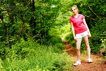 Image showing Woman In Red Running