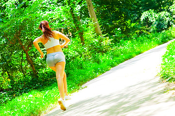 Image showing Woman Runner In The Woods