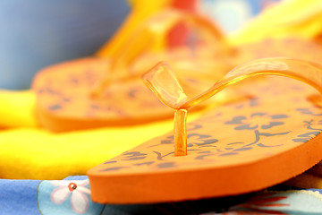 Image showing orange flip flops