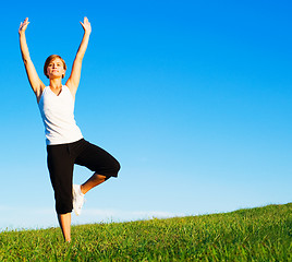 Image showing Young Woman Doing Yoga