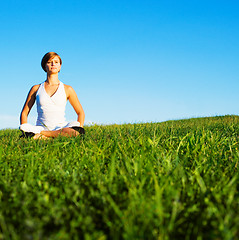 Image showing Young Woman Doing Yoga