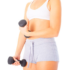 Image showing Young Woman Lifting Weights