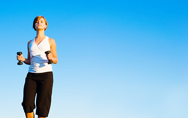 Image showing Young Woman Walking