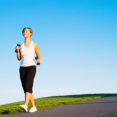 Image showing Young Woman Walking