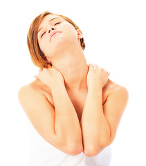 Image showing Woman in Towel Massaing Herself