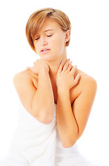 Image showing Woman in Towel Massaing Herself