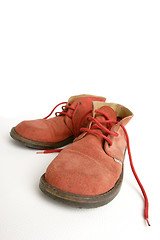 Image showing old red boots