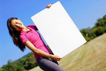 Image showing Girl With Poster